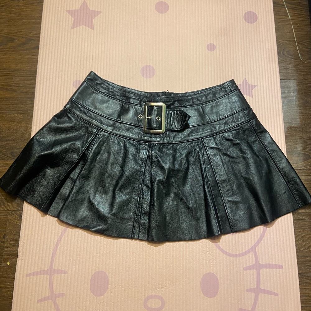 North Bound Leather black “School Girl” mini skirt.